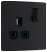 PCDMB21B Front - This Evolve Matt Black 13A single switched socket from British General has been designed with angled in line colour coded terminals and backed out captive screws for ease of installation, and fits a 25mm back box making it an ideal retro-fit replacement for existing sockets.