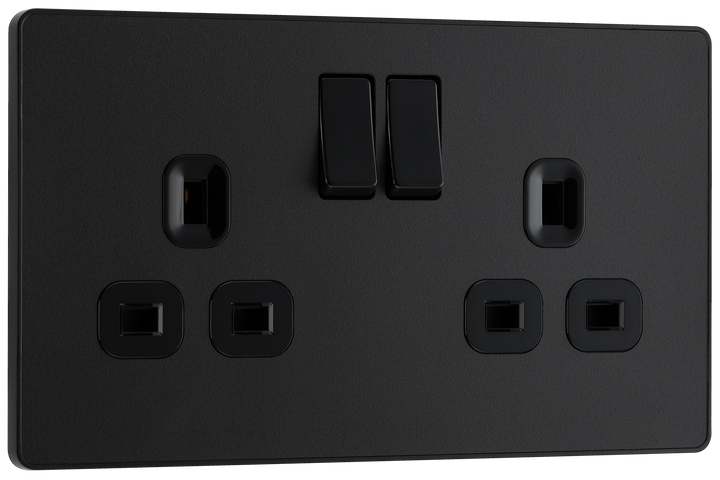 PCDMB22B Front - This Evolve Matt Black 13A double switched socket from British General has been designed with angled in line colour coded terminals and backed out captive screws for ease of installation, and fits a 25mm back box making it an ideal retro-fit replacement for existing sockets.