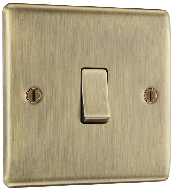 NAB12 Front - This antique brass finish 20A 16AX single light switch from British General will operate one light in a room.