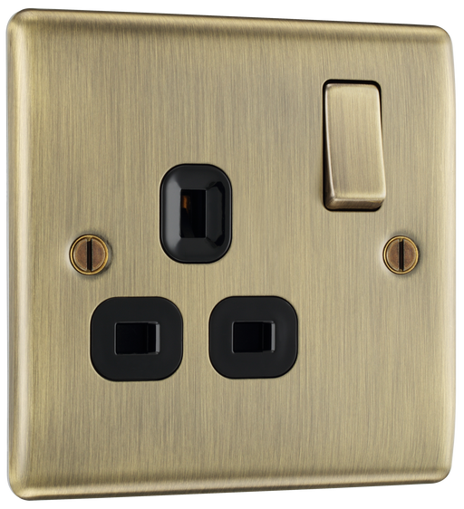 NAB21B Front - This antique brass finish 13A single switched socket from British General has a sleek and slim profile with softly rounded edges and no visible plastic around the switch to add a touch of luxury to your decor.