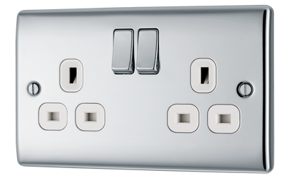 NPC22W Front - This polished chrome finish 13A double switched socket from British General has a sleek and slim profile, with softly rounded edges and no visible plastic around the switch to add a touch of luxury to your decor.