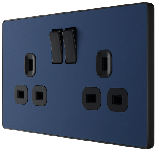 PCDDB22B Side - This Evolve Matt Blue 13A double switched socket from British General has been designed with angled in line colour coded terminals and backed out captive screws for ease of installation, and fits a 25mm back box making it an ideal retro-fit replacement for existing sockets.