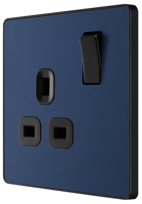 PCDDB21B Side - This Evolve Matt Blue 13A single switched socket from British General has been designed with angled in line colour coded terminals and backed out captive screws for ease of installation, and fits a 25mm back box making it an ideal retro-fit replacement for existing sockets. 