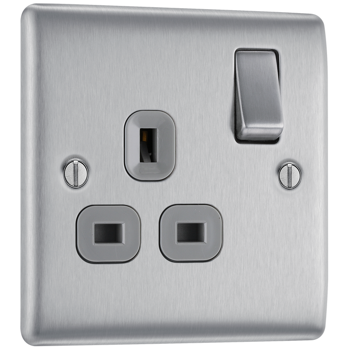 NBS21G Front - This brushed steel finish 13A single switched socket from British General has a sleek and slim profile with softly rounded edges, anti-fingerprint lacquer and no visible plastic around the switch for a luxurious finish.