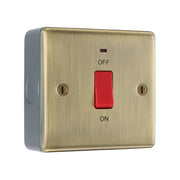 BG Nexus Antique Brass Single Plate 45A DP Neon Cooker Switch with Surface Pattress Back Box by British General (BG-NAB74+MC501)