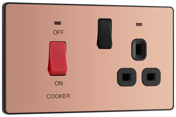 PCDCP70B Front - This Evolve Polished Copper 45A cooker control unit from British General includes a 13A socket for an additional appliance outlet, and has flush LED indicators above the socket and switch.