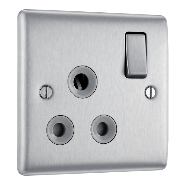 NBS99G Front - This 15A round pin switched socket from British General has a brushed steel finish with an anti-fingerprint lacquer and a sleek and slim profile with softly rounded edges to add a touch of luxury to your decor.