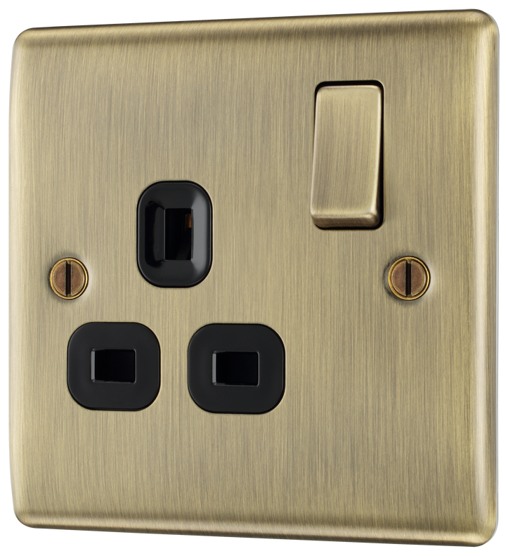 NAB21B Front - This antique brass finish 13A single switched socket from British General has a sleek and slim profile with softly rounded edges and no visible plastic around the switch to add a touch of luxury to your decor.